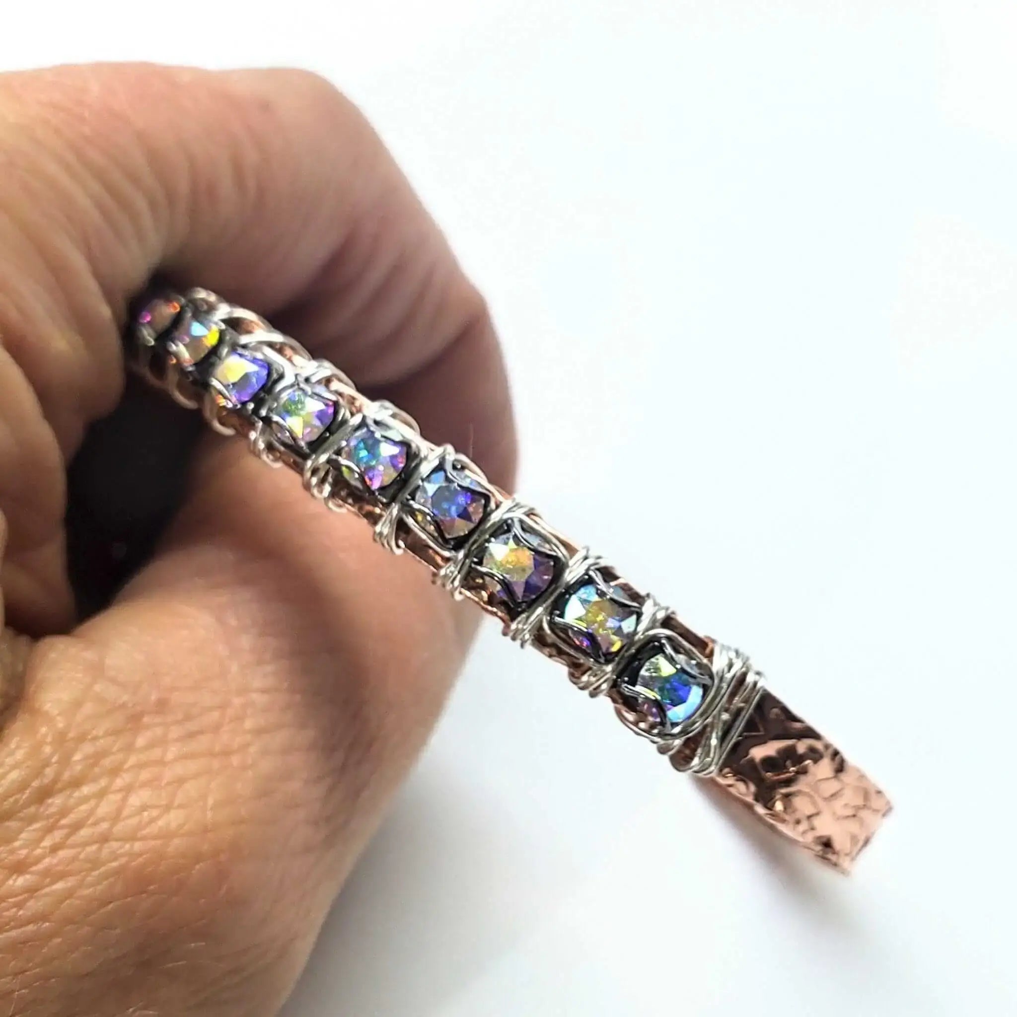 Elevate Your Style with the Dazzling Silver Wire Wrapped Crystal Textured Copper Cuff Set